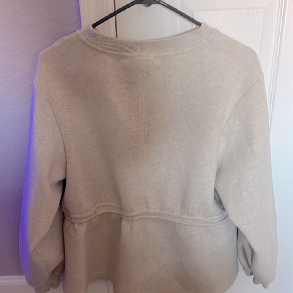 Varley shirt size Small.  But it is oversized